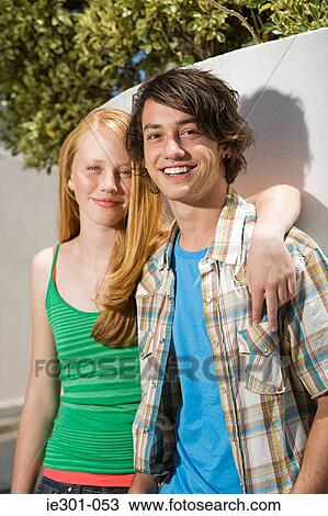 Portrait of a teenage couple View Large Photo Image Stock Image - Portrait of a teenage couple. Fotosearch