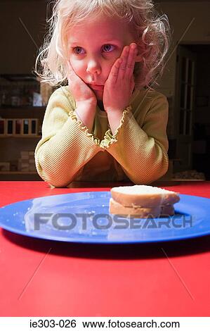 A bored girl View Large Photo Image Stock Photograph - A bored girl. Fotosearch