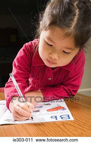 A girl writing View Large Photo Image Stock Image - A girl writing. Fotosearch