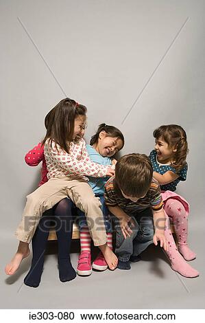 Stock Image - Children fooling around. Fotosearch