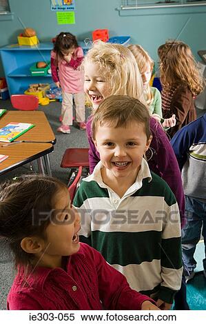 Children in a classroom View Large Photo Image Stock Photography - Children in a classroom. Fotosearch