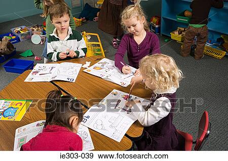 Children in a lesson View Large Photo Image Stock Photo - Children in a lesson. Fotosearch