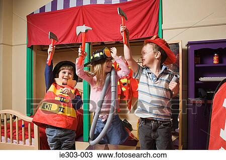 Children pretending to be firefighters View Large Photo Image Stock Image - Children pretending to be firefighters. Fotosearch