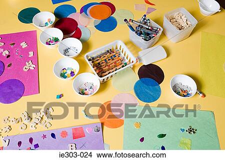 Paper and crayons on a table View Large Photo Image Picture - Paper and crayons on a table. Fotosearch