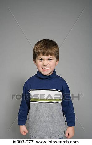 Portrait of an angry boy View Large Photo Image Stock Photo - Portrait of an angry boy. Fotosearch