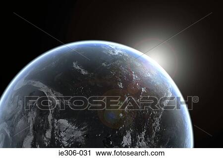 Stock Image - Sun emerging over planet earth. Fotosearch