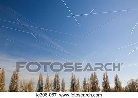 Stock Photo - Vapour trails in the sky. Fotosearch
