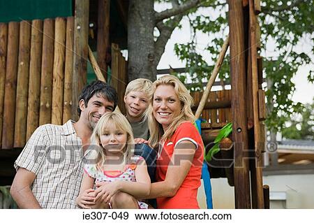 Stock Photo - Portrait of a family. Fotosearch