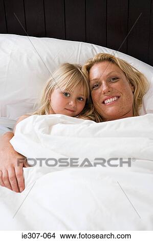 Picture - Portrait of a mother and daughter. Fotosearch
