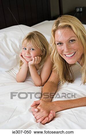 Portrait of a mother and daughter View Large Photo Image Stock Image - Portrait of a mother and daughter. Fotosearch