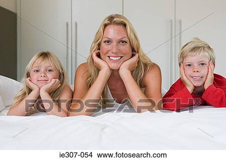 Portrait of a mother and her children View Large Photo Image Picture - Portrait of a mother and her children. Fotosearch