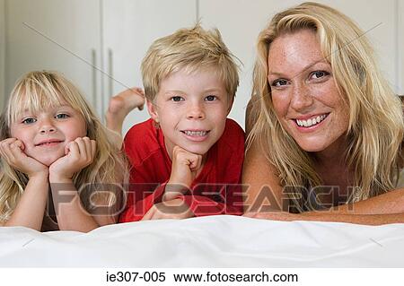 Portrait of a mother and her children View Large Photo Image Stock Photography - Portrait of a mother and her children. Fotosearch