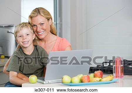 Portrait of a mother and son View Large Photo Image Stock Image - Portrait of a mother and son. Fotosearch