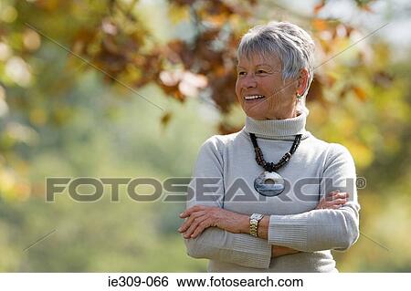 Portrait of a senior woman View Large Photo Image Stock Photograph - Portrait of a senior woman. Fotosearch