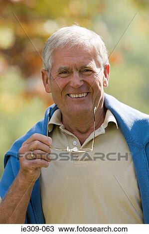 Stock Image - Smiling senior man. Fotosearch