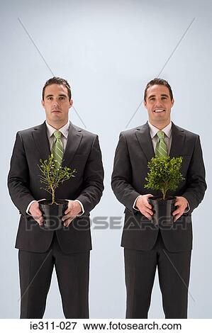 Businessmen with plants View Large Photo Image Stock Photo - Businessmen with plants. Fotosearch