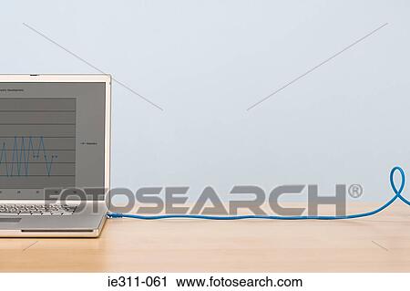 Laptop and cable View Large Photo Image Stock Image - Laptop and cable. Fotosearch