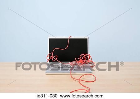 Laptop and cable View Large Photo Image Stock Image - Laptop and cable. Fotosearch