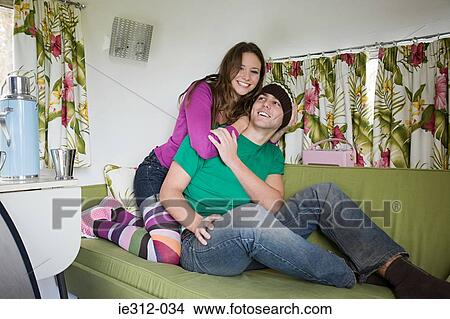 A teenage couple fooling around View Large Photo Image Picture - A teenage couple fooling around. Fotosearch