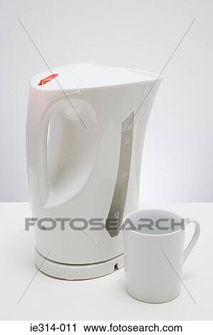 A cup and kettle View Large Photo Image Stock Image - A cup and kettle. Fotosearch