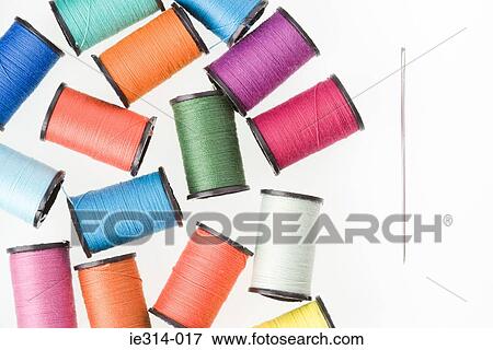 A needle and cotton reels View Large Photo Image Stock Photo - A needle and cotton reels. Fotosearch