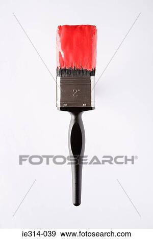Stock Photo - A paintbrush with paint on on it. Fotosearch