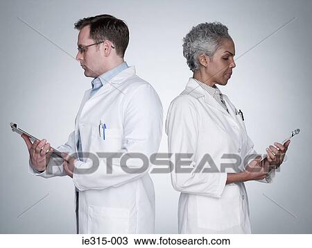 Stock Image - Doctors with clipboards. Fotosearch