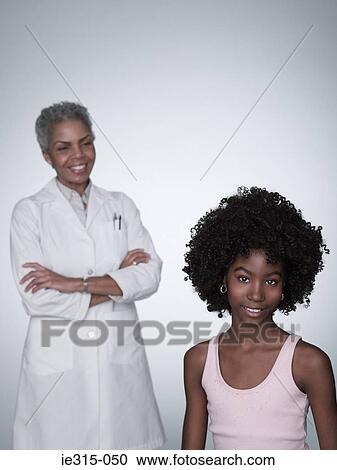 Girl and doctor View Large Photo Image Stock Image - Girl and doctor. Fotosearch
