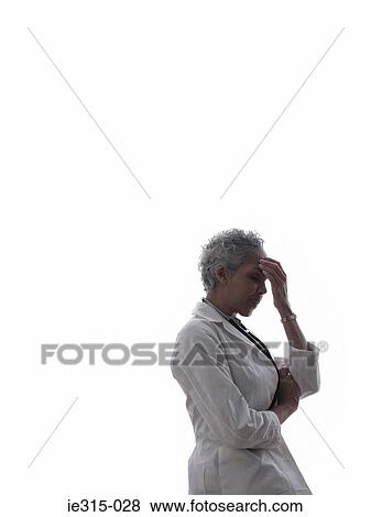Stressed doctor View Large Photo Image Stock Photo - Stressed doctor. Fotosearch