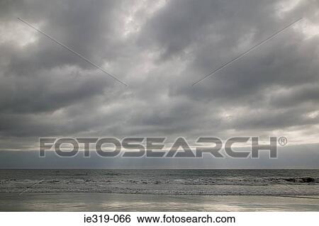 Ocean and cloudy sky View Large Photo Image Stock Photograph - Ocean and cloudy sky. Fotosearch