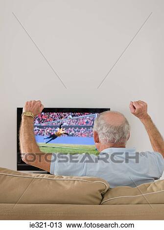A senior man cheering View Large Photo Image Stock Image - A senior man cheering. Fotosearch