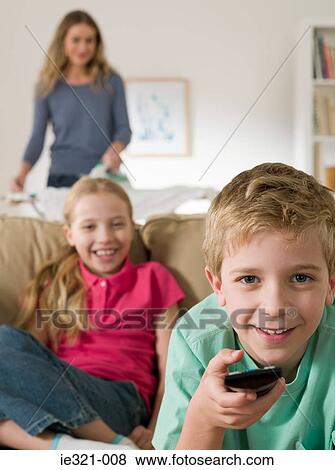 Children watching tv View Large Photo Image Stock Photo - Children watching tv. Fotosearch