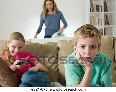 Stock Photography - Children watching tv. Fotosearch