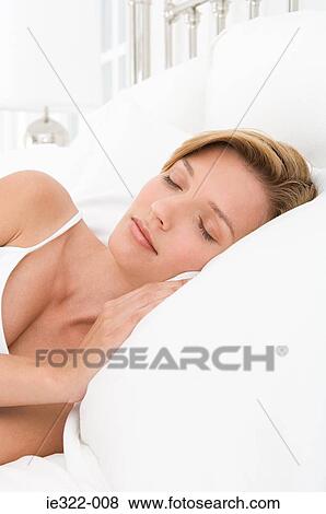 A woman sleeping View Large Photo Image Stock Photo - A woman sleeping. Fotosearch