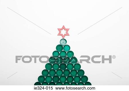 A christmas tree made out of bottle tops View Large Photo Image Stock Photography - A christmas tree made out of bottle tops. Fotosearch