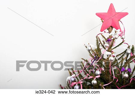 Christmas decorations on a tree View Large Photo Image Stock Image - Christmas decorations on a tree. Fotosearch