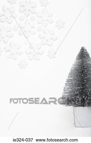 Christmas tree and snowflake decorations View Large Photo Image Stock Photo - Christmas tree and snowflake decorations. Fotosearch