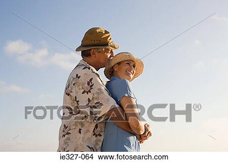 Couple hugging View Large Photo Image Picture - Couple hugging. Fotosearch
