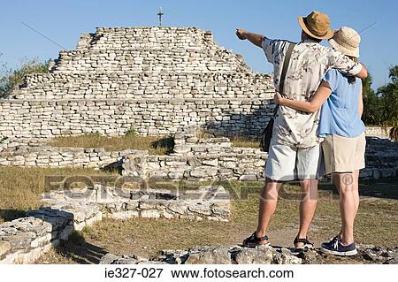Couple looking at ruins View Large Photo Image Stock Photo - Couple looking at ruins. Fotosearch