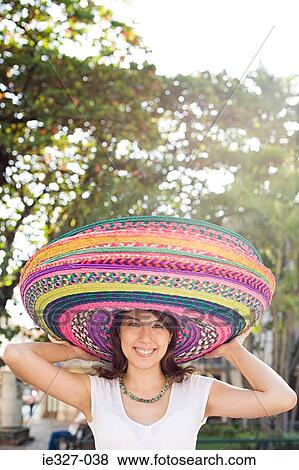 Woman wearing sombreros View Large Photo Image Stock Photo - Woman wearing sombreros. Fotosearch