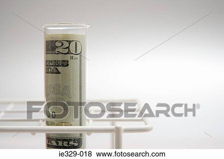 American banknote in a test tube View Large Photo Image Stock Photo - American banknote in a test tube. Fotosearch