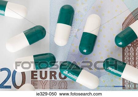 Capsules on a euro note View Large Photo Image Stock Image - Capsules on a euro note. Fotosearch