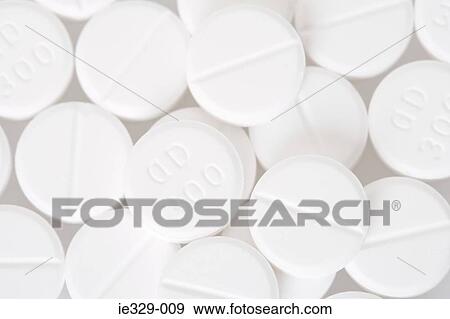Close up of white pills View Large Photo Image Stock Photo - Close up of white pills. Fotosearch