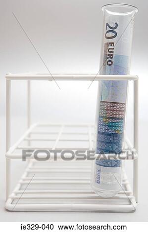 Euro currency in a test tube View Large Photo Image Stock Image - Euro currency in a test tube. Fotosearch