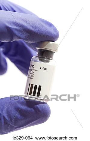 Medicine bottle being held View Large Photo Image Picture - Medicine bottle being held. Fotosearch
