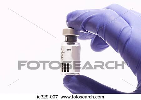 Medicine bottle being held View Large Photo Image Stock Photo - Medicine bottle being held. Fotosearch