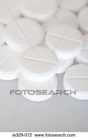 Round white tablets View Large Photo Image Stock Image - Round white tablets. Fotosearch