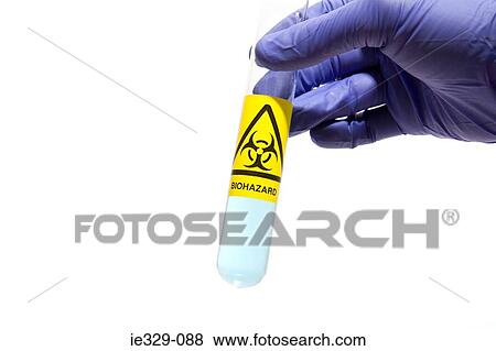 Scientist holding a test tube View Large Photo Image Stock Photo - Scientist holding a test tube. Fotosearch