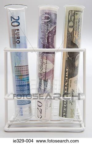 Three banknotes in test tubes View Large Photo Image Picture - Three banknotes in test tubes. Fotosearch