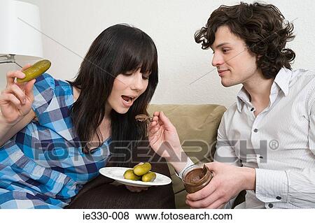 Pregnant woman craving food View Large Photo Image Stock Photo - Pregnant woman craving food. Fotosearch
